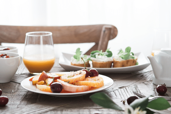 table with food on plates